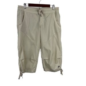 𝅺nike CROPPED CARGOS WITH TIE‎ HEMS